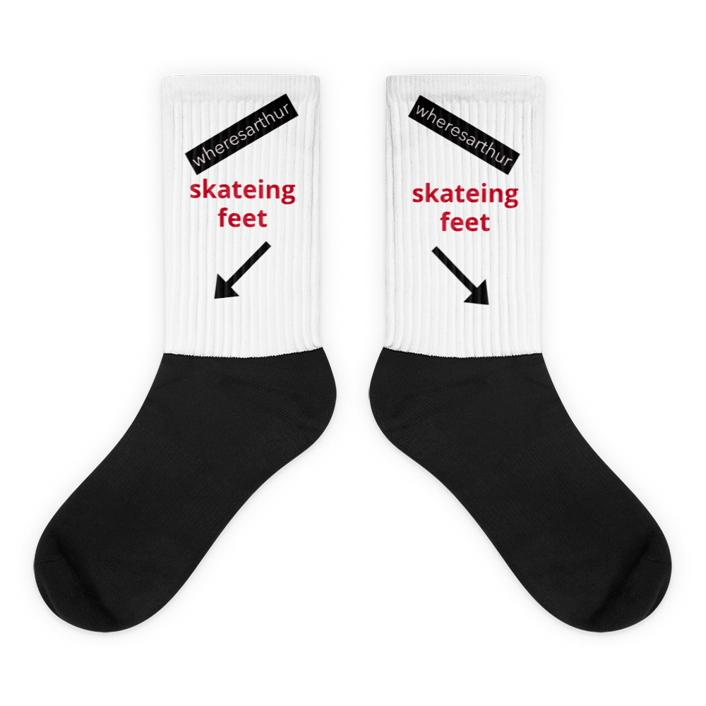 socks that say skating feet with a arrow pointing at the feet