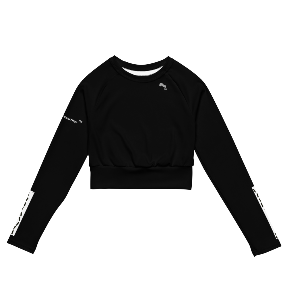 Women's black crop top with x marks the spot logo  on left and right sleeves. Question mark logo on chest and wheresathur on right sleeve