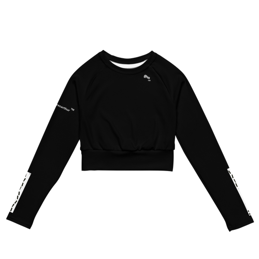 Women's black crop top with x marks the spot logo  on left and right sleeves. Question mark logo on chest and wheresathur on right sleeve