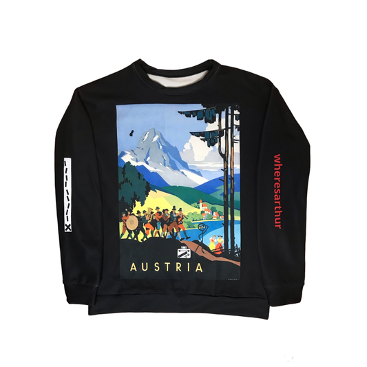 Hype beast styled  black sweatshirt with x marks the spot  and wheresarthur logo on sleeves. Picture of Austria with wheresathur logo suitcase by his side on front of sweatshirt